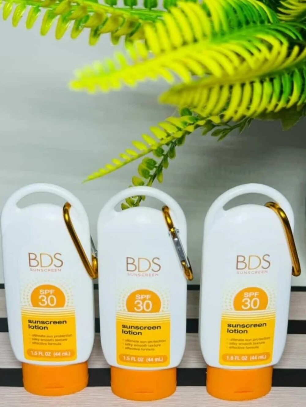 BDS SPF 30 Sunscreen Lotion - White & Orange Travel Bottles (1)